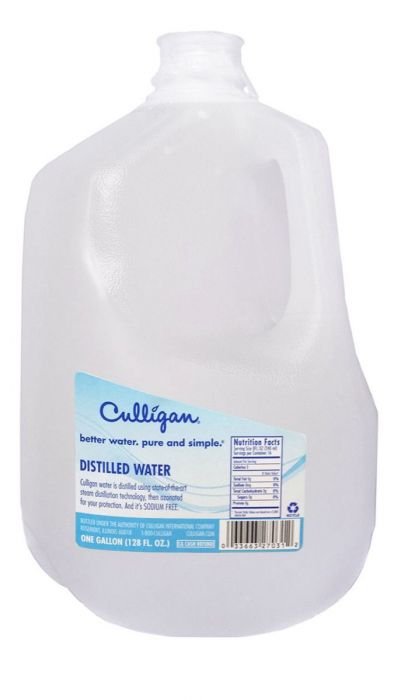 A one-gallon clear plastic jug of Culligan Distilled Water with a blue and white label. The label reads 'Culligan,' 'better water. pure and simple.,' 'DISTILLED WATER,' and 'ONE GALLON (128 FL. OZ.).' The jug is full of clear liquid.