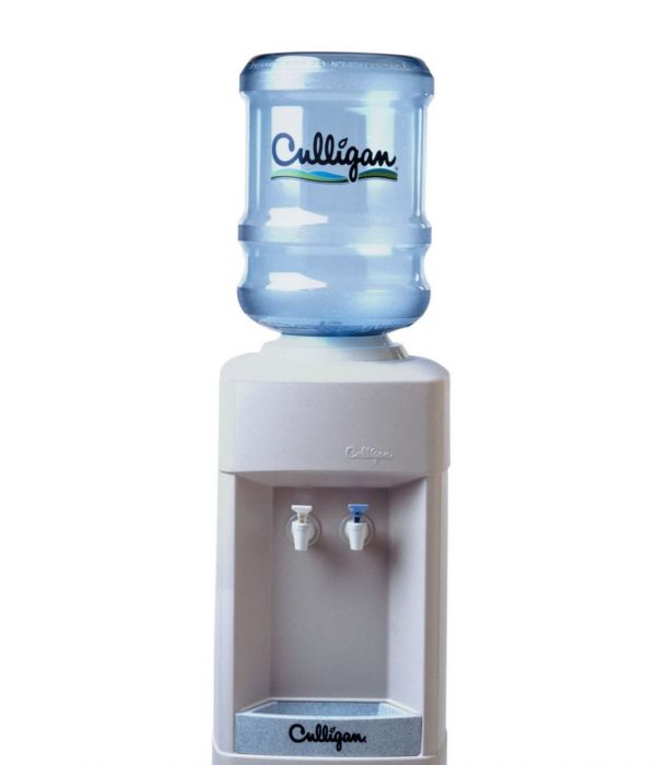 A Culligan water cooler with a large blue water bottle on top of a light gray dispenser unit, featuring two spigots and a drip tray with the Culligan logo.