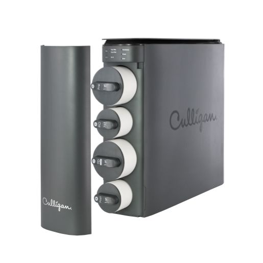 A dark gray Culligan water filtration system with four vertical filter cartridges and a separate cover, shown against a white background.