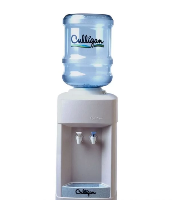 A Culligan water cooler with a clear blue water bottle on top, featuring a light gray dispenser unit with two spigots and a drip tray, set against a white background.