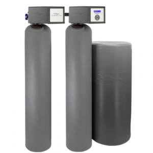 A Culligan Smart High Efficiency Twin water treatment system, featuring two tall grey tanks with control heads and a shorter, wider grey brine tank, all against a black background.