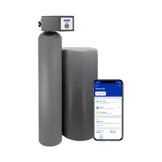 A Culligan Smart HE water treatment system, consisting of two gray cylindrical units, displayed next to a smartphone showing the 
