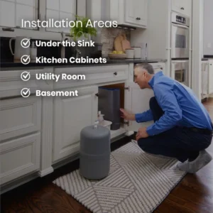 A man installing a gray water filtration system under a kitchen sink, with a gray storage tank on the floor. Text lists 'Installation Areas' like 'Under the Sink' and 'Basement'.