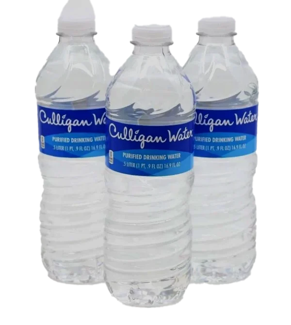 Three Culligan Purified Drinking Water bottles with blue labels and white caps, filled with clear water, against a black background.